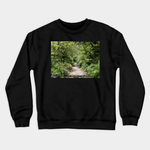 Beautiful young family on a walk in autumn fores Crewneck Sweatshirt by fantastic-designs